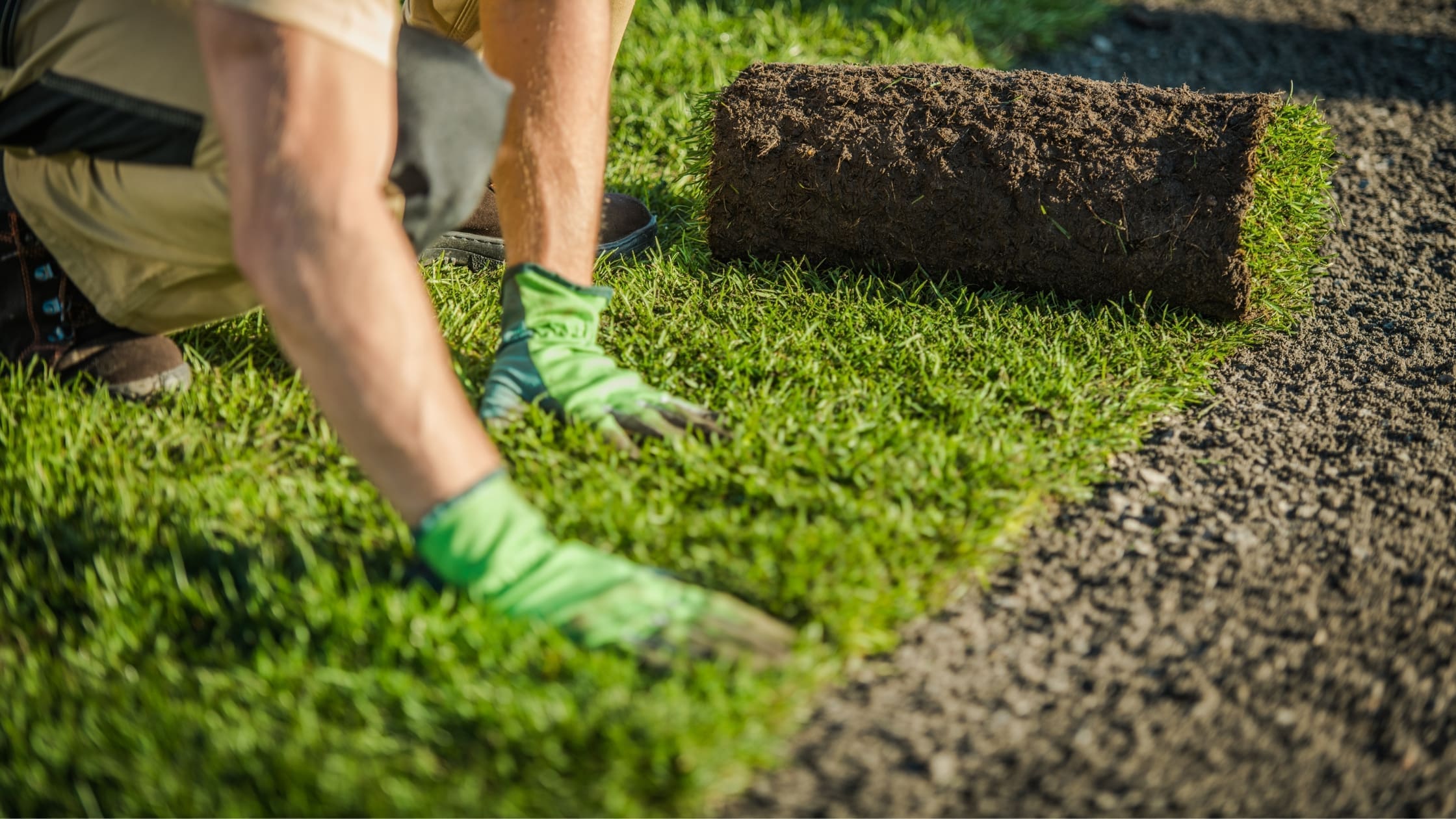 laying artificial grass turf