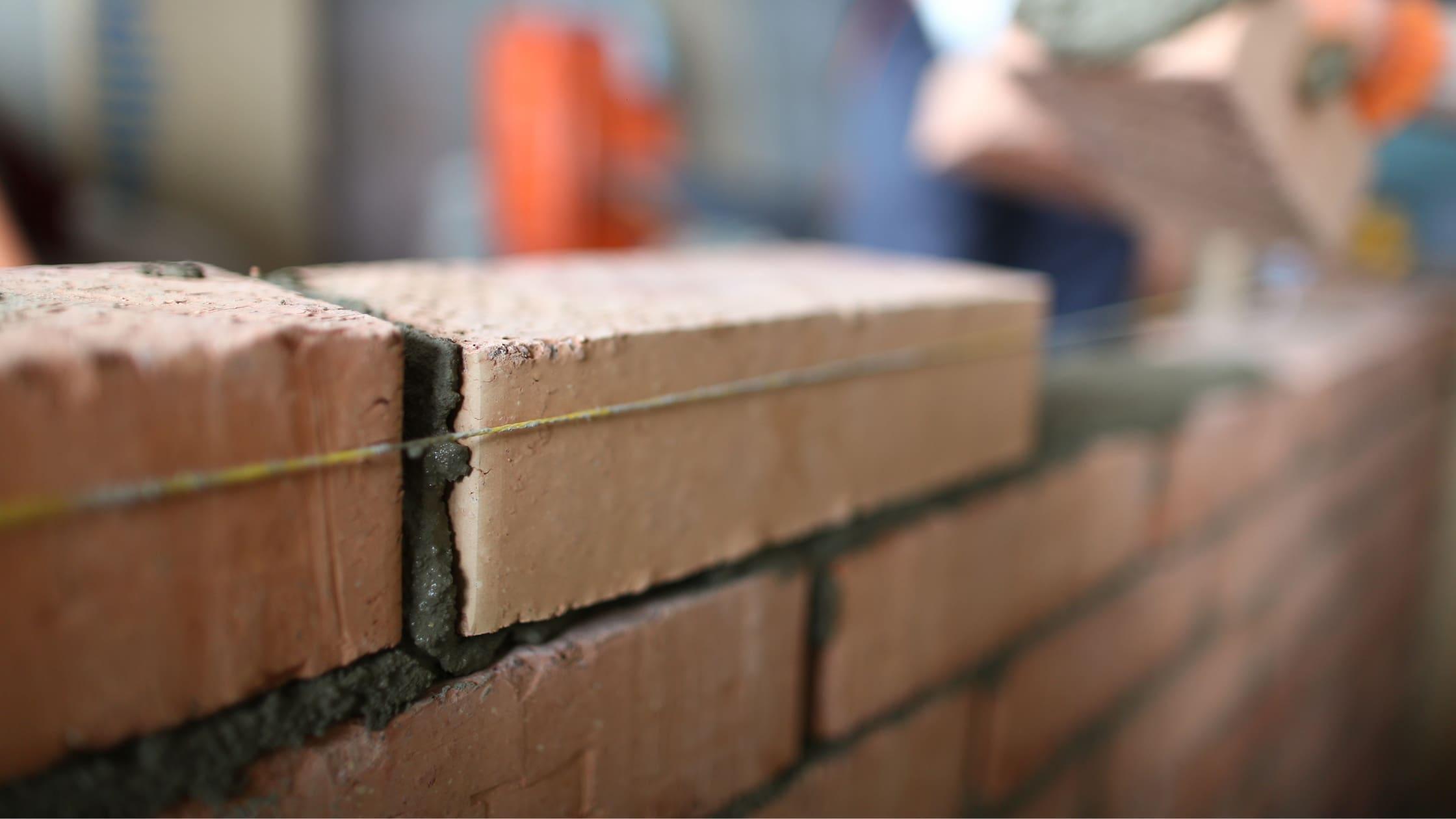 Common Property Refurbishments in the UK (blog post) Laying bricks