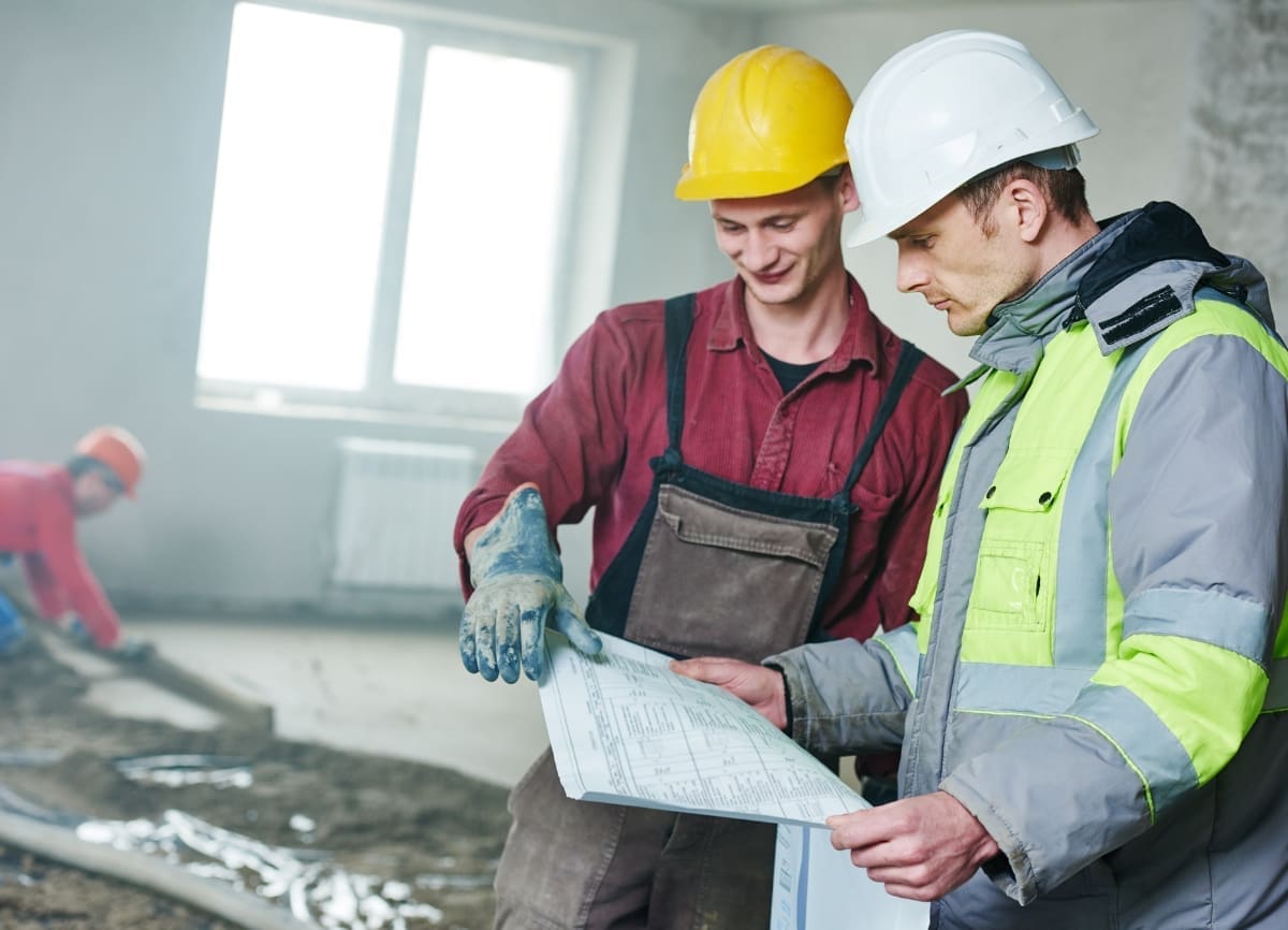 builders discussing building plans