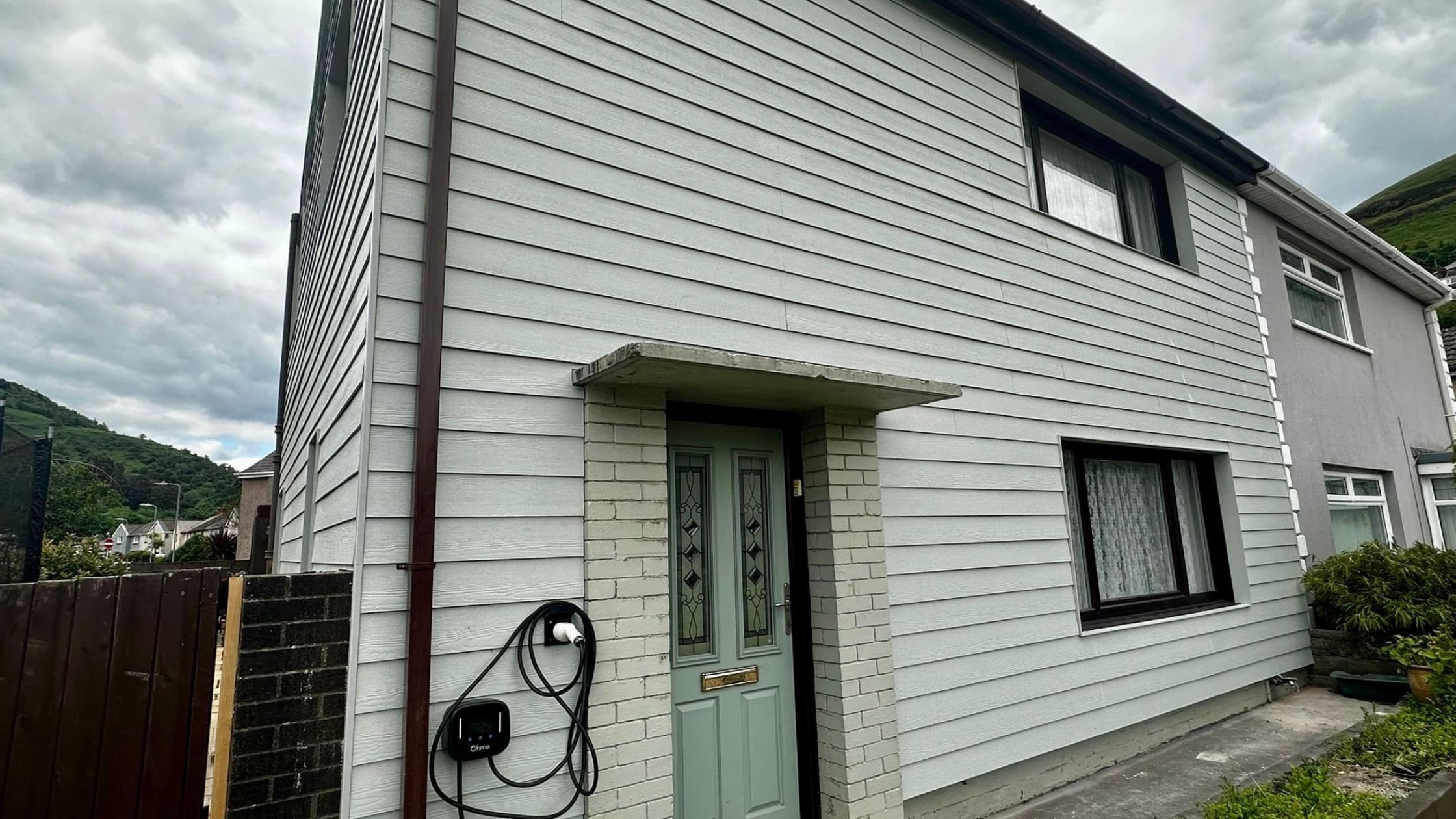 external re-cladding on house
