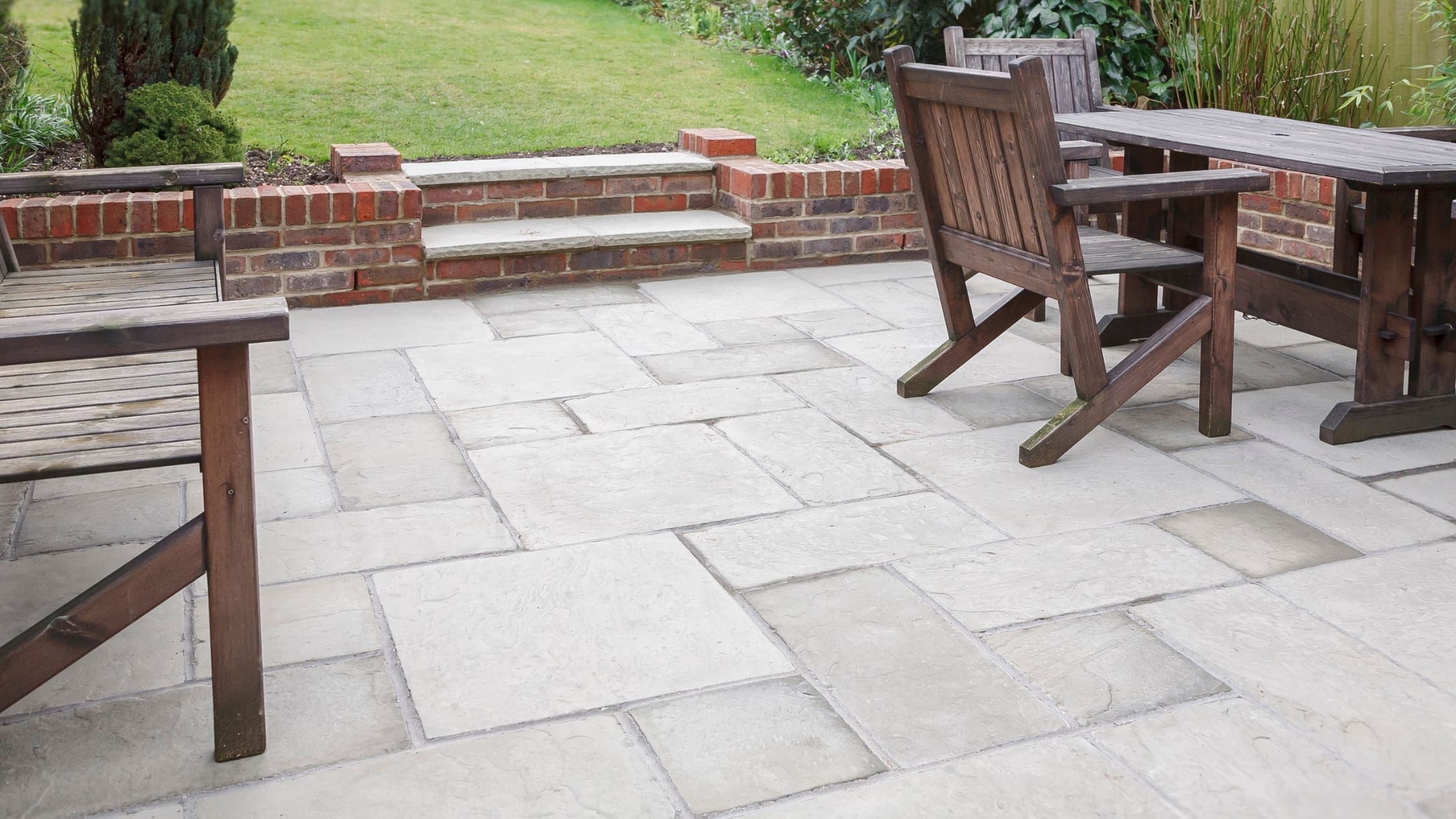 garden patio with table and chairs
