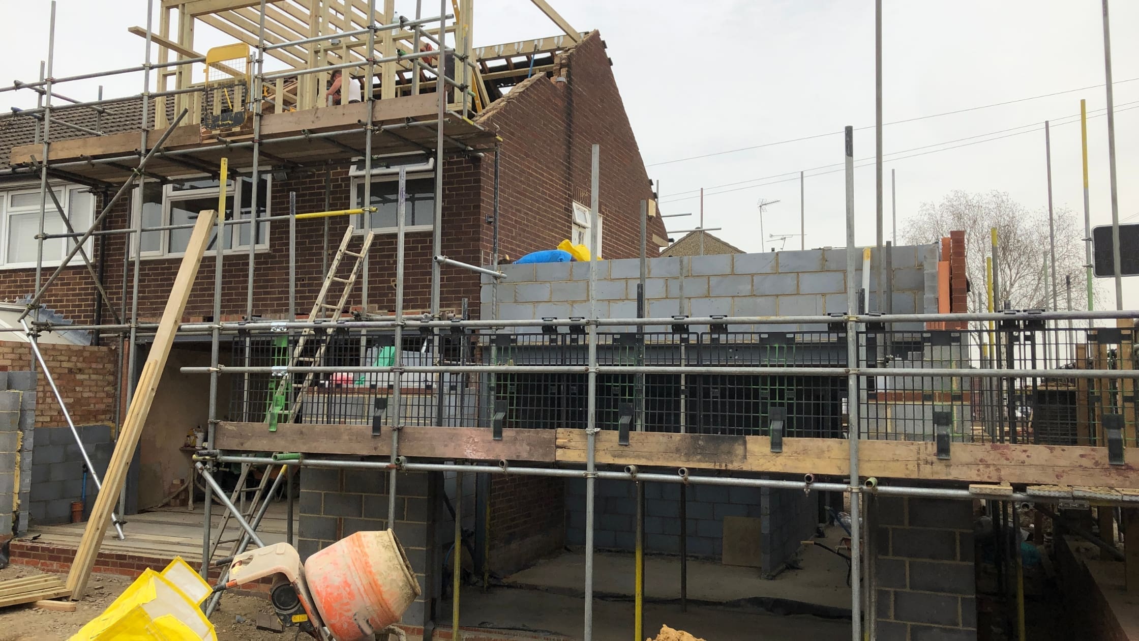 single story house extensions under construction