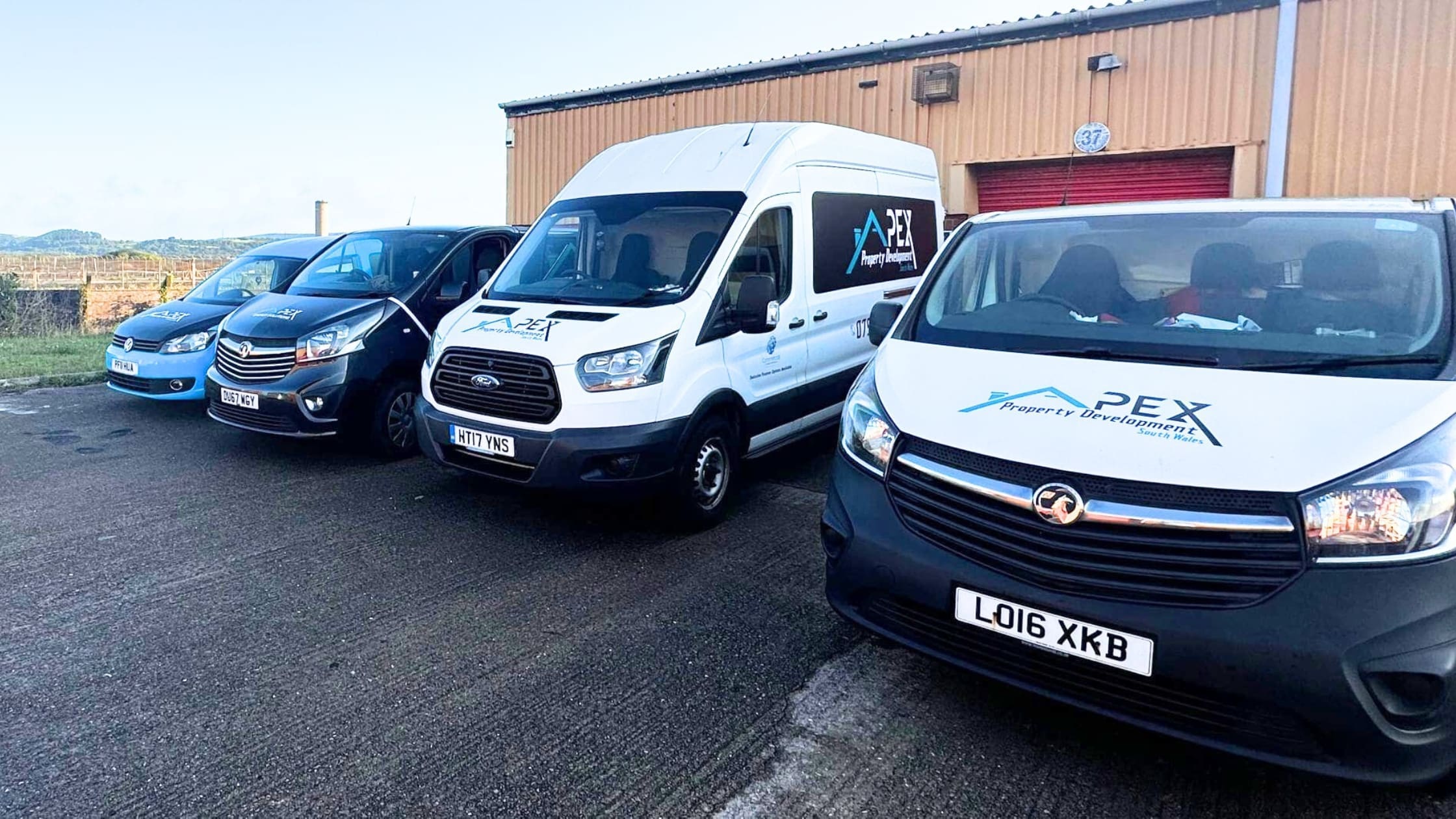 We Have Moved! (Blog Banner) Apex offices and vans