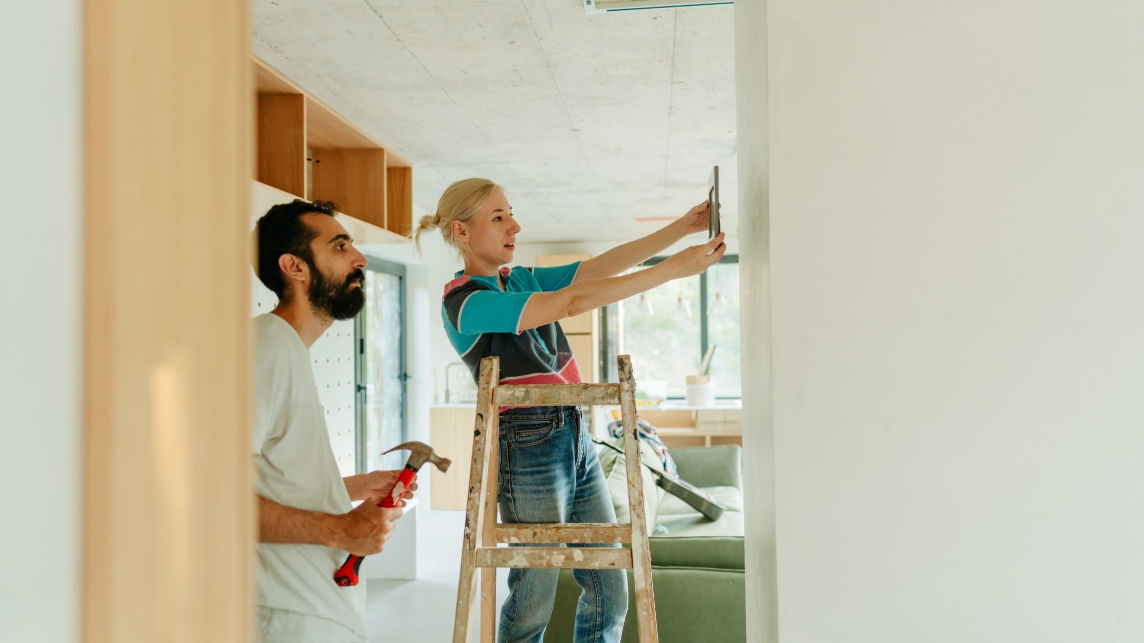 Winter Home Improvement Projects (Blog Post) Man and woman decorating
